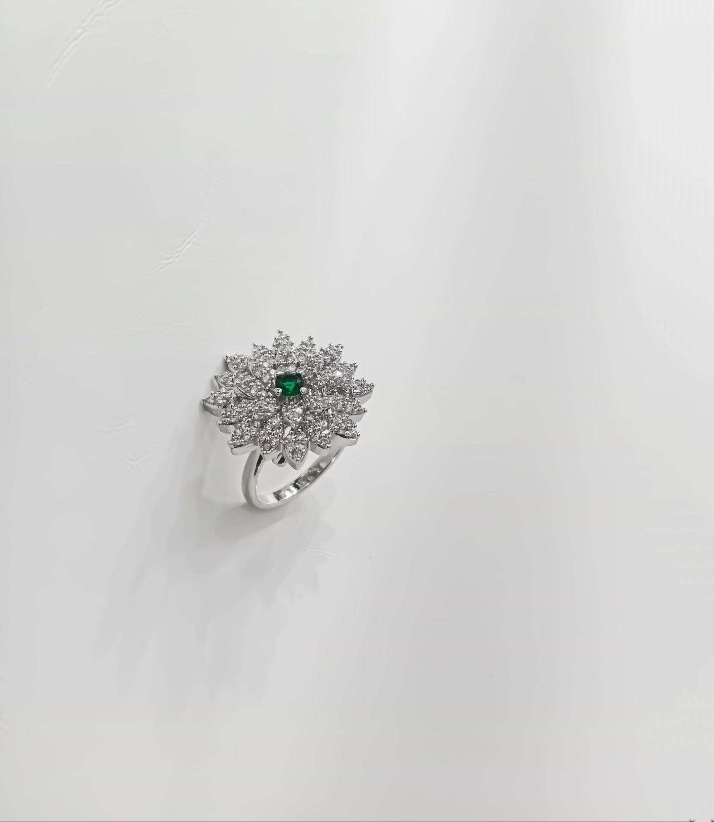 Emerald Frost Bloom – The Crowned Petal Ring