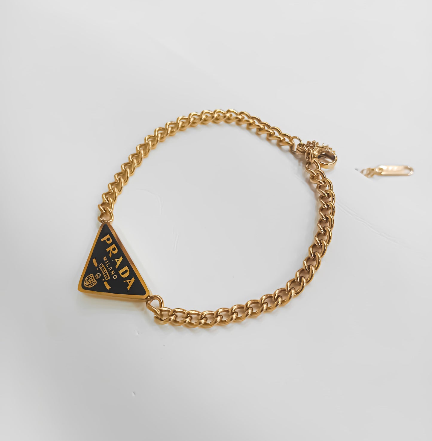 Gilded Icon – PRADA-Inspired Fashion Bracelet